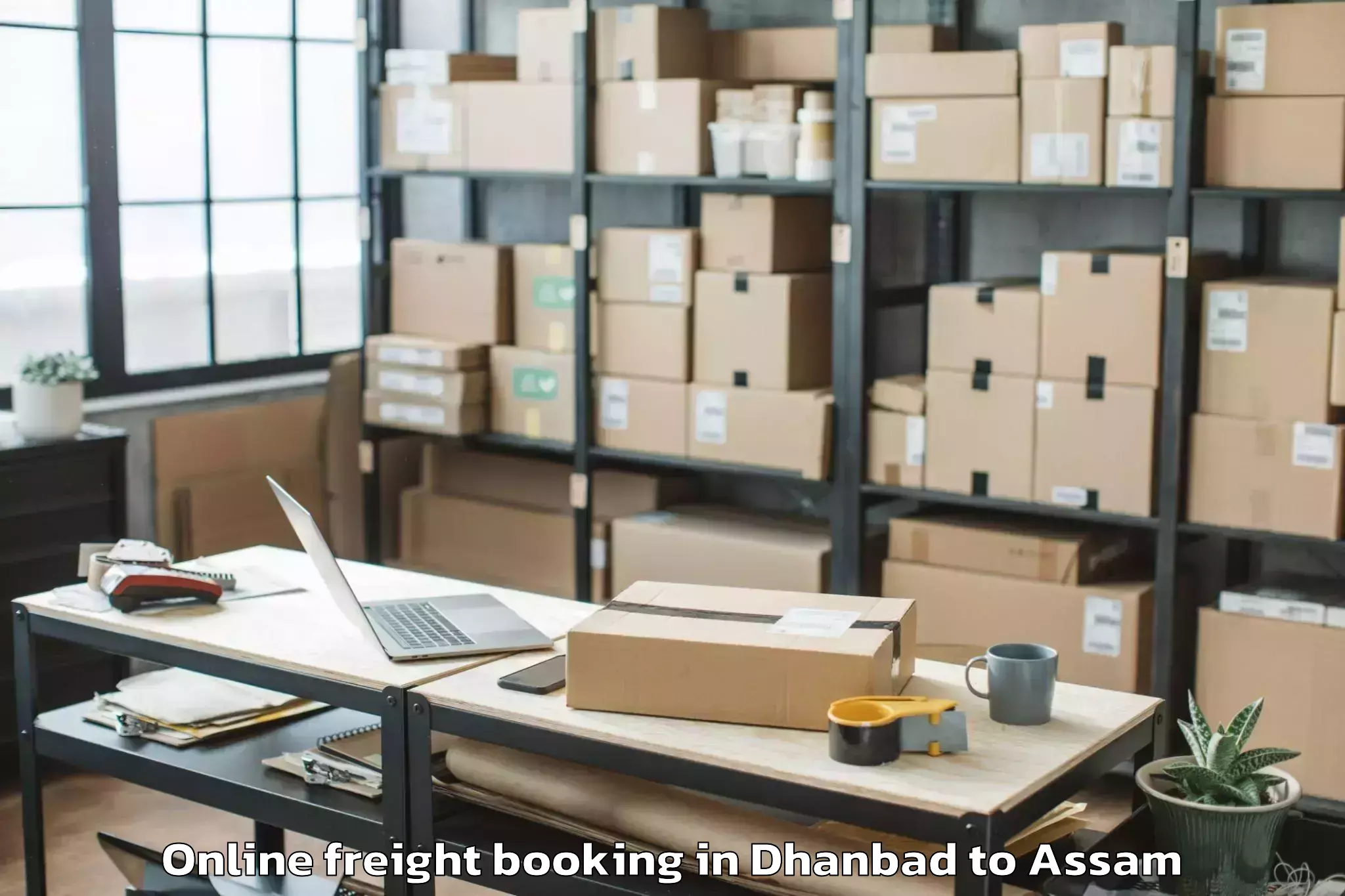 Dhanbad to Kampur Town Online Freight Booking Booking